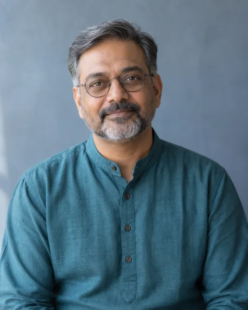 Illustrative portrait of Nikhil · Clear Compass, a fictional AI guide